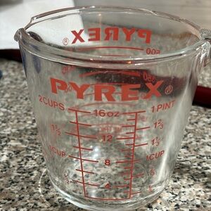 Vintage Pyrex Clear Glass Measuring Cup with Red Accents - pour spout has a chip